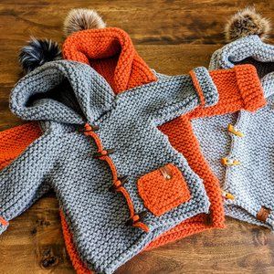 Hand knitted Dark grey coat with cape and pompom